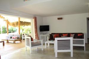 Uma área de estar em Caribbean Beach Villa Playa Bonita Las Terrenas