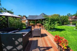 Vonkajšia záhrada v ubytovaní Apartament Glamour
