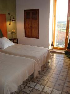 Postel nebo postele na pokoji v ubytování La Casa Grande