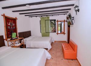 Hotel Alto de los Andaquies客房内的一张或多张床位