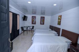 Hotel Alto de los Andaquies客房内的一张或多张床位