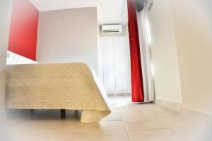 Postel nebo postele na pokoji v ubytování Hostal Playa Candor