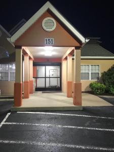 a building with a sign on the front of it at Microtel Inn by Wyndham - Murfreesboro in Murfreesboro