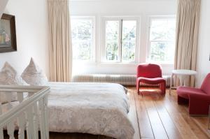 Een bed of bedden in een kamer bij Kalkmarkt Suites