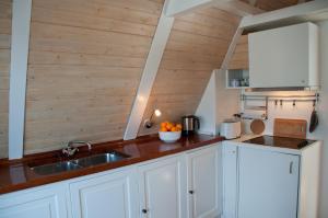 Een keuken of kitchenette bij Kalkmarkt Suites