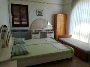 Posteľ alebo postele v izbe v ubytovaní Apartment Sv. Juraj 4