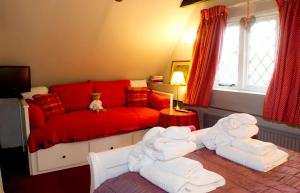 A bed or beds in a room at Strand House 