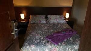 Een bed of bedden in een kamer bij Vento Sul