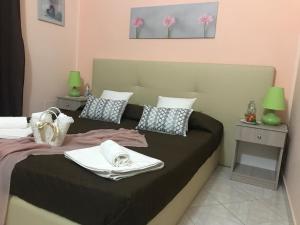 A bed or beds in a room at AFFITTACAMERE Il Cortile