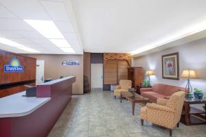 a lobby of a hospital with a waiting room at Days Inn by Wyndham Statesboro in Statesboro