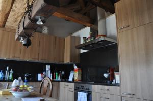 Kuhinja oz. manjša kuhinja v nastanitvi Attika Wohnung 7546 Ardez