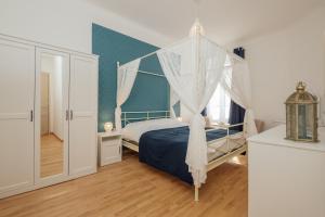 En eller flere senge i et værelse på Le Neptune, 2 bedrooms with A/C