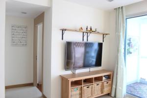 TV a/nebo společenská místnost v ubytování Pattaya Private Beach Luxury Home