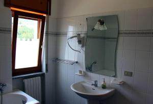 Vannituba majutusasutuses Lucantò Accommodations