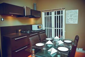 Kuchyň nebo kuchyňský kout v ubytování Donald Mansion