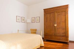 Voodi või voodid majutusasutuse Corte degli Orti toas