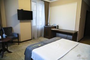 Katil atau katil-katil dalam bilik di Boulevard Hotel
