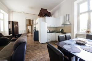 Kuchyň nebo kuchyňský kout v ubytování Urban Rooms