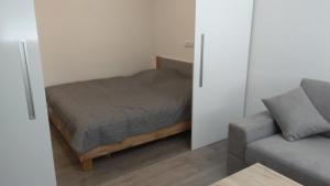 Postel nebo postele na pokoji v ubytování Apt.Jana ,apt.Terezka