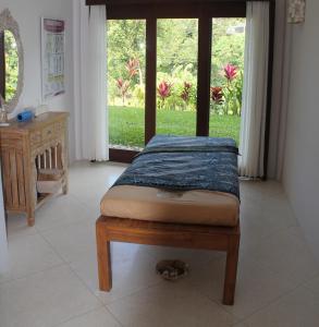 Кровать или кровати в номере Amori Villas