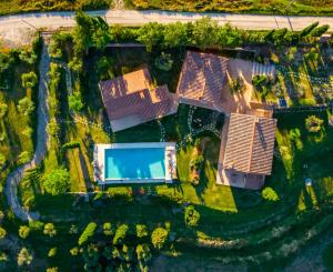 an overhead view of a yard with a pool at Poggio ai Gelsi in Pienza