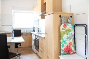 Kuchyň nebo kuchyňský kout v ubytování Holidayapartment Rüsselsheim