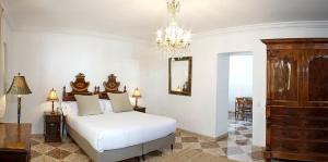 Postel nebo postele na pokoji v ubytování Casa Delmonte - Turismo de Interior