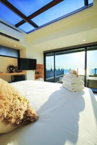 Llit o llits en una habitació de Laguna Villas & Resorts