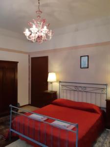 Ένα ή περισσότερα κρεβάτια σε δωμάτιο στο Fiabe Venice Rooms