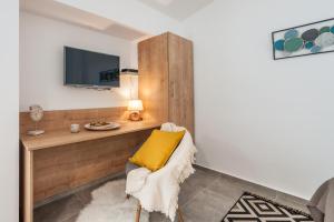 TV a/nebo společenská místnost v ubytování City Vibe Studios