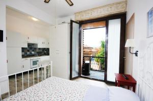 A bed or beds in a room at Cortesia 4