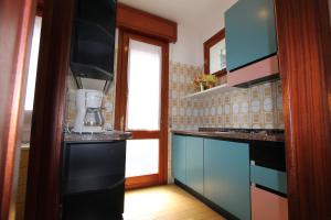 A kitchen or kitchenette at Villa Agavi
