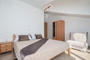 Postel nebo postele na pokoji v ubytování Villa Katy