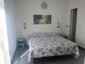 Postel nebo postele na pokoji v ubytování Albergo Al Carugio