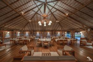 Um restaurante ou outro lugar para comer em Jaguaribe Lodge e Kite