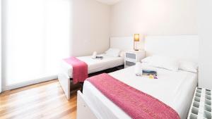 Posteľ alebo postele v izbe v ubytovaní Concha Beach Apartment - SSHousing