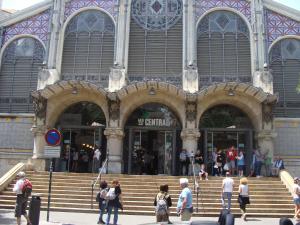 a group of people walking in front of a building at Apartamento Torres in Valencia