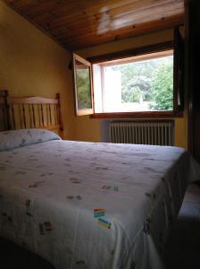 Postel nebo postele na pokoji v ubytování Pensión Rural Arroyo la Teja