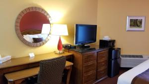 Een TV en/of entertainmentcenter bij Dew Drop Inn
