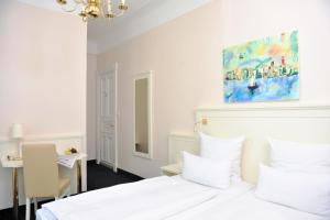 Postel nebo postele na pokoji v ubytování Hotel Fürst Bismarck