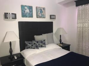 Postel nebo postele na pokoji v ubytování Hotel Rey