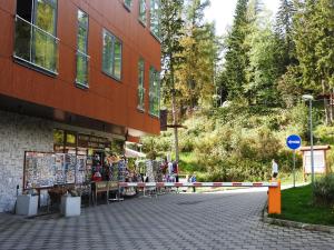 a street in front of a building at Štrbské Pleso rezidencia Oliver - apartmán 16A in Štrbské Pleso