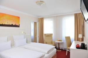 TV a/nebo společenská místnost v ubytování Hotel Fürst Bismarck