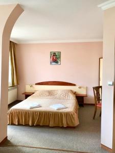 Postel nebo postele na pokoji v ubytování Daf Trans Hotel + 37 fotografií