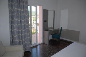 Postel nebo postele na pokoji v ubytování Hotel Grifeu