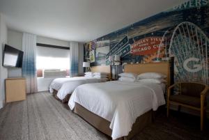 Una cama o camas en una habitación de Hotel Versey Days Inn by Wyndham Chicago