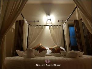 Bua Patumma Resort客房内的一张或多张床位