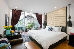 Giường trong phòng chung tại Splendid Star Grand Hotel and Spa