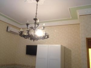 A television and/or entertainment centre at IL B&B Maison Graziella