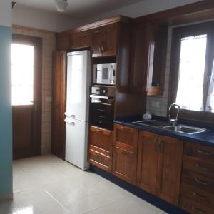 Kuchyň nebo kuchyňský kout v ubytování Casa Girdana
